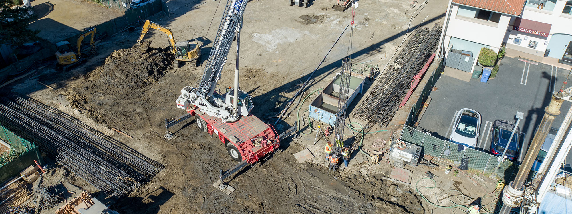 San Luis Square, San Luis Obispo, CA Builder - Design and Build Contractors - Multi-story Mixed Use Building Construction - Condos - Condominium Construction - Retail Shopping Center - Underground Parking - Structural Steel and Wood Framing Construction - JW Design & Construction