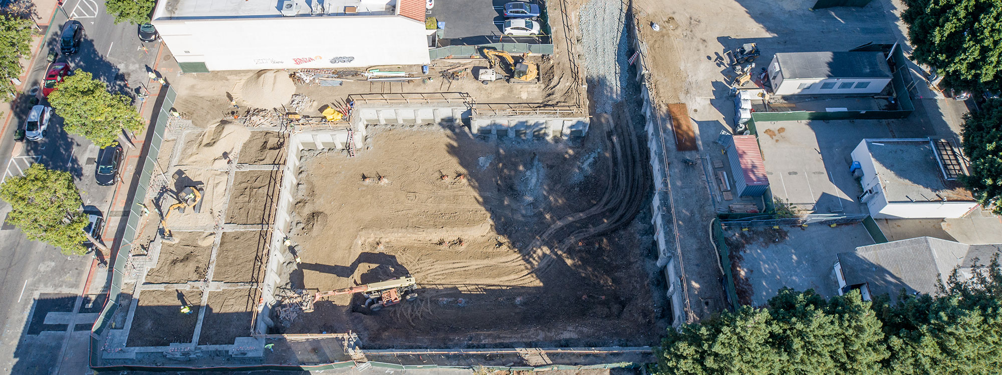 San Luis Square, San Luis Obispo, CA Builder - Design and Build Contractors - Multi-story Mixed Use Building Construction - Condos - Condominium Construction - Retail Shopping Center - Underground Parking - Structural Steel and Wood Framing Construction - JW Design & Construction