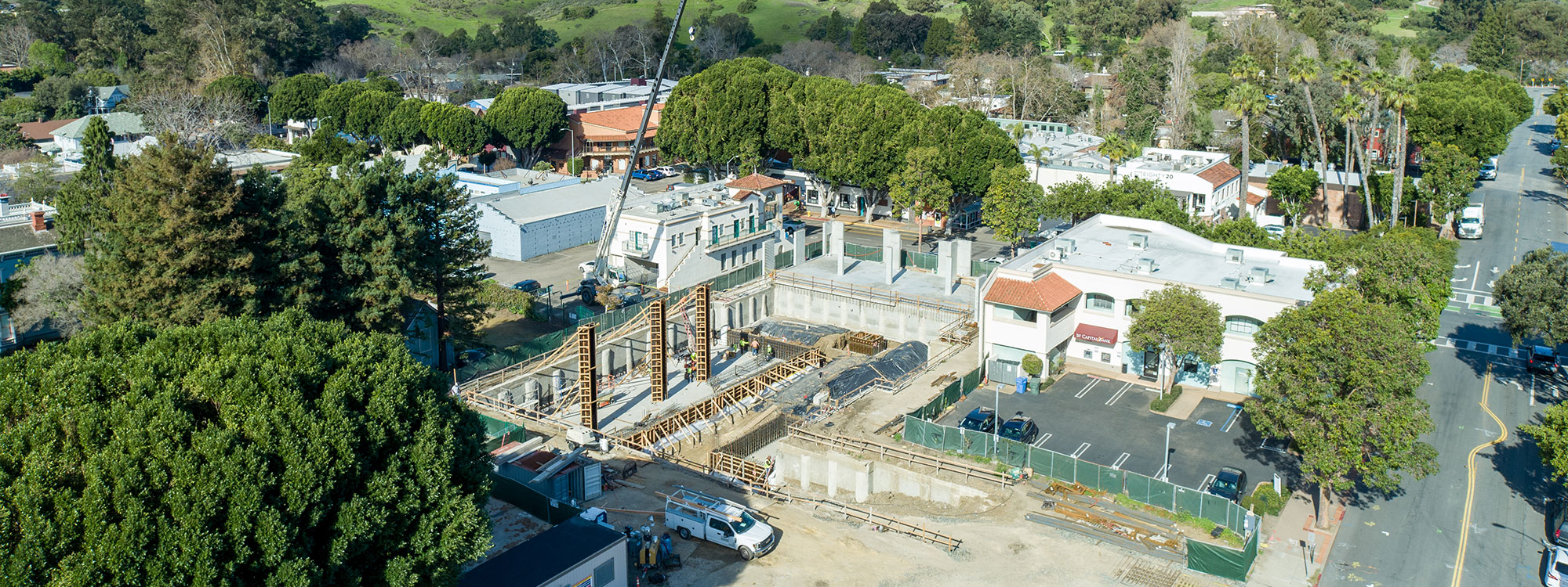 San Luis Square, San Luis Obispo, CA Builder - Design and Build Contractors - Multi-story Mixed Use Building Construction - Condos - Condominium Construction - Retail Shopping Center - Underground Parking - Structural Steel and Wood Framing Construction - JW Design & Construction