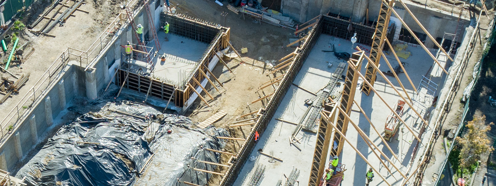 San Luis Square, San Luis Obispo, CA Builder - Design and Build Contractors - Multi-story Mixed Use Building Construction - Condos - Condominium Construction - Retail Shopping Center - Underground Parking - Structural Steel and Wood Framing Construction - JW Design & Construction