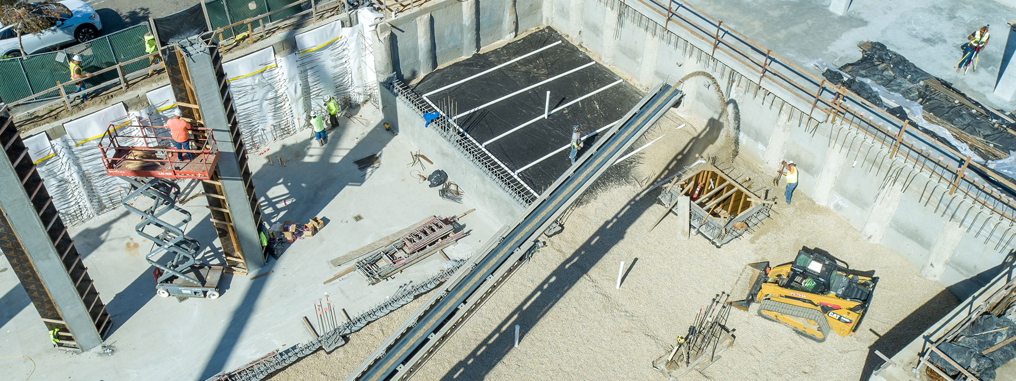 San Luis Square, San Luis Obispo, CA Builder - Design and Build Contractors - Multi-story Mixed Use Building Construction - Condos - Condominium Construction - Retail Shopping Center - Underground Parking - Structural Steel and Wood Framing Construction - JW Design & Construction