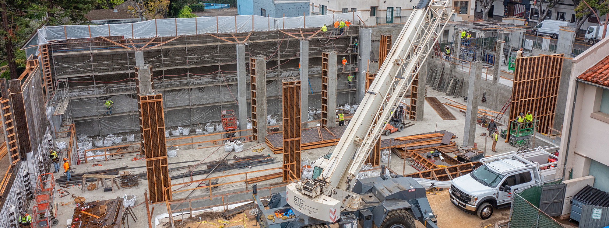 San Luis Square, San Luis Obispo, CA Builder - Design and Build Contractors - Multi-story Mixed Use Building Construction - Condos - Condominium Construction - Retail Shopping Center - Underground Parking - Structural Steel and Wood Framing Construction - JW Design & Construction