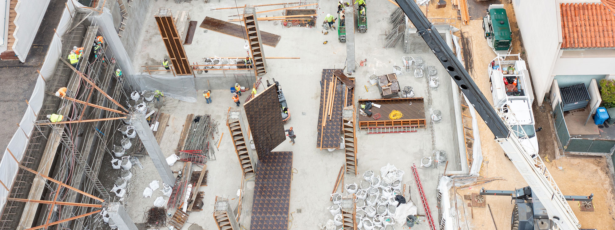 San Luis Square, San Luis Obispo, CA Builder - Design and Build Contractors - Multi-story Mixed Use Building Construction - Condos - Condominium Construction - Retail Shopping Center - Underground Parking - Structural Steel and Wood Framing Construction - JW Design & Construction