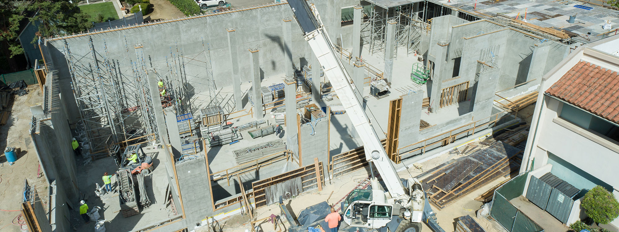 San Luis Square, San Luis Obispo, CA Builder - Design and Build Contractors - Multi-story Mixed Use Building Construction - Condos - Condominium Construction - Retail Shopping Center - Underground Parking - Structural Steel and Wood Framing Construction - JW Design & Construction