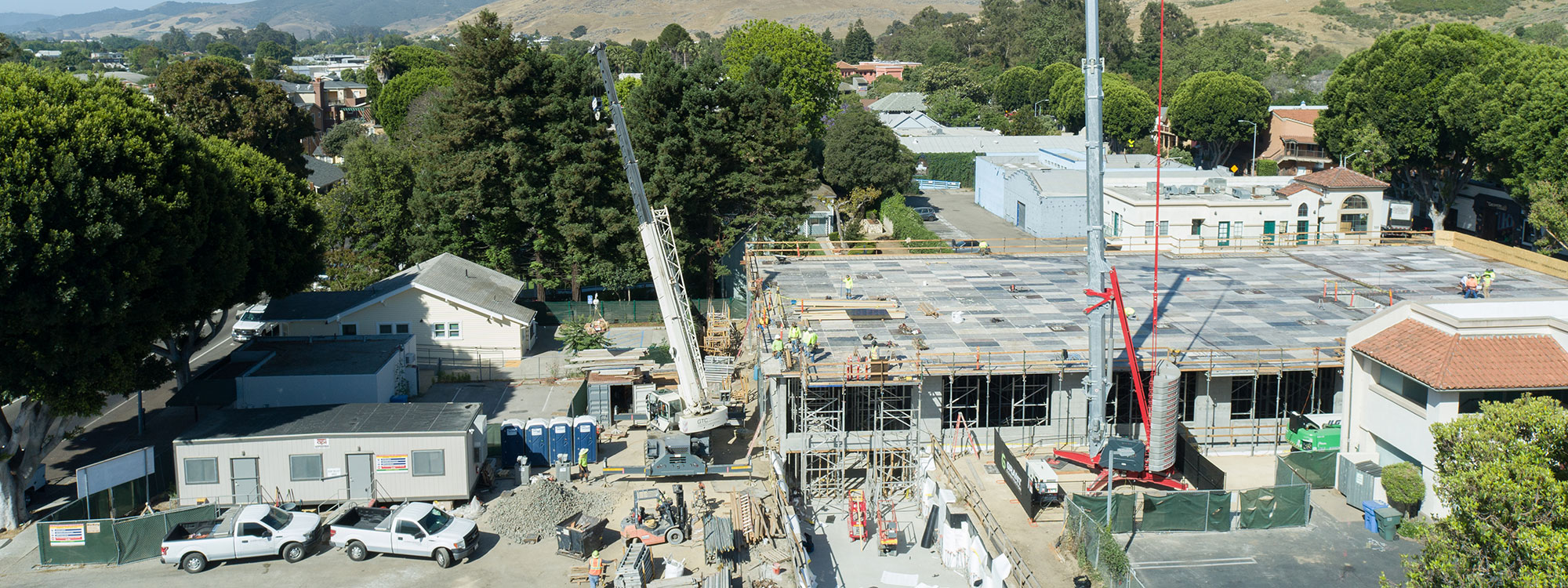 San Luis Square, San Luis Obispo, CA Builder - Design and Build Contractors - Multi-story Mixed Use Building Construction - Condos - Condominium Construction - Retail Shopping Center - Underground Parking - Structural Steel and Wood Framing Construction - JW Design & Construction