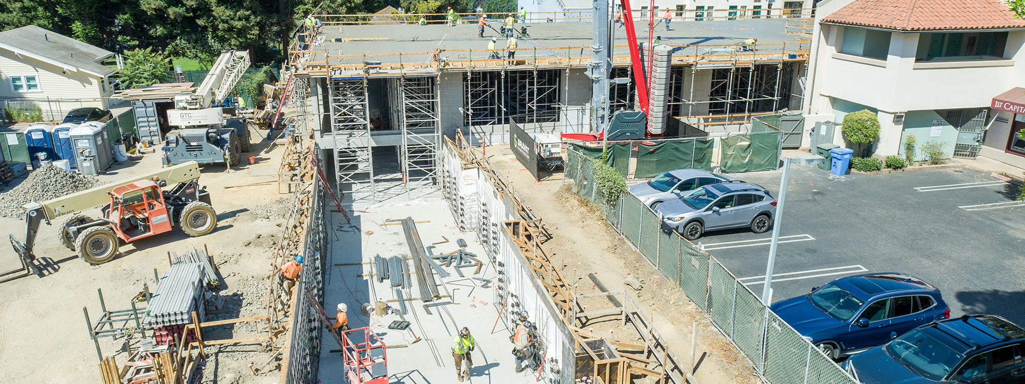 San Luis Square, San Luis Obispo, CA Builder - Design and Build Contractors - Multi-story Mixed Use Building Construction - Condos - Condominium Construction - Retail Shopping Center - Underground Parking - Structural Steel and Wood Framing Construction - JW Design & Construction