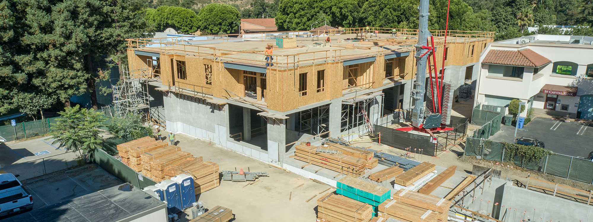 San Luis Square, San Luis Obispo, CA Builder - Design and Build Contractors - Multi-story Mixed Use Building Construction - Condos - Condominium Construction - Retail Shopping Center - Underground Parking - Structural Steel and Wood Framing Construction - JW Design & Construction