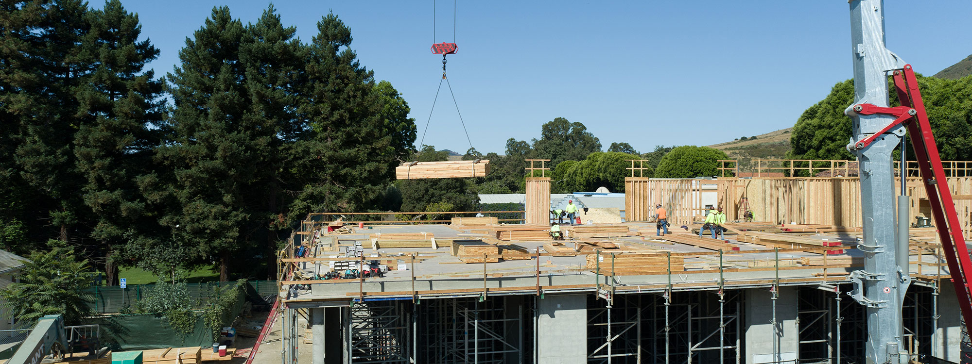 San Luis Square, San Luis Obispo, CA Builder - Design and Build Contractors - Multi-story Mixed Use Building Construction - Condos - Condominium Construction - Retail Shopping Center - Underground Parking - Structural Steel and Wood Framing Construction - JW Design & Construction